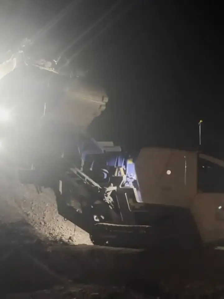 Screening plant running under floodlights during a night shift